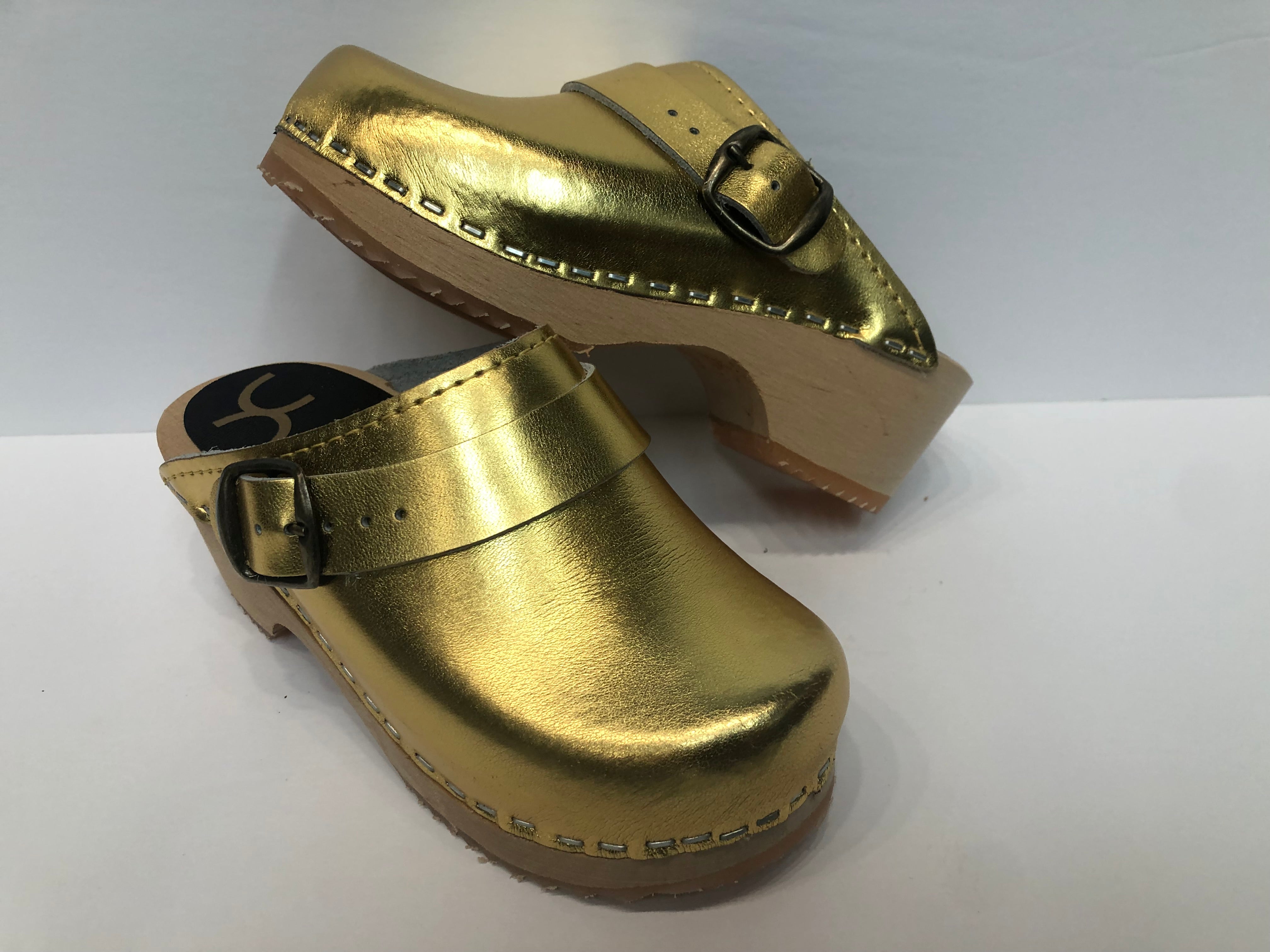 Golden clogs hot sale